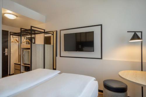 Habitación Deluxe del hotel München City Center affiliated by Meliá. Foto 3