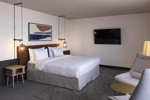 Suite Junior con balcón del hotel Scandic Nürnberg Central. Foto 1