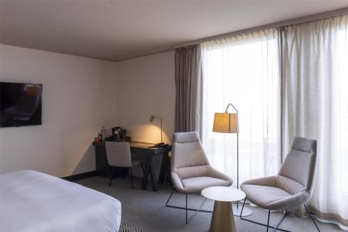 Suite Junior con balcón del hotel Scandic Nürnberg Central. Foto 3