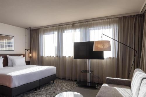 Suite Junior con balcón del hotel Scandic Nürnberg Central. Foto 9