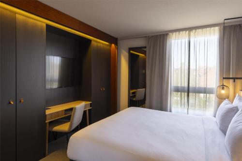 Suite con cama extragrande del hotel Scandic Nürnberg Central. Foto 3