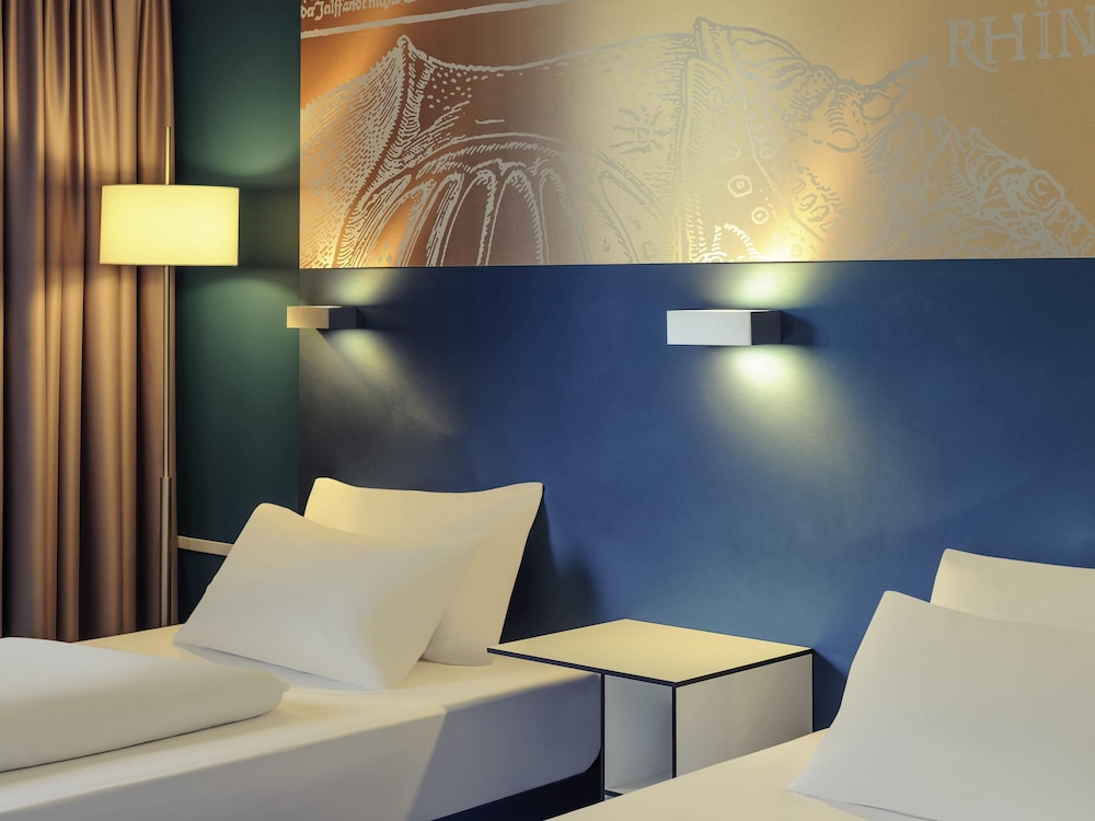 Habitación estándar con dos camas individuales, ubicación tranquila junto al parque del hotel Congress Mercure Nürnberg An Der Messe. Foto 5