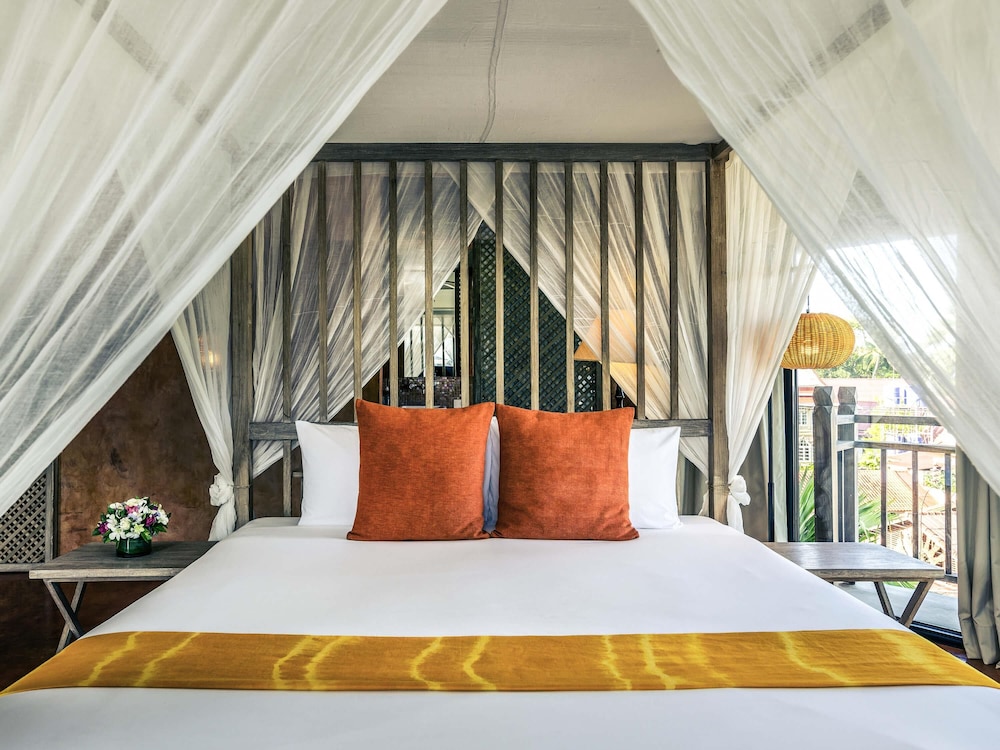Suite Junior con 1 Cama Doble Vistas a la Ciudad Ala Jardín del hotel Mercure Samui Chaweng Tana. Foto 1