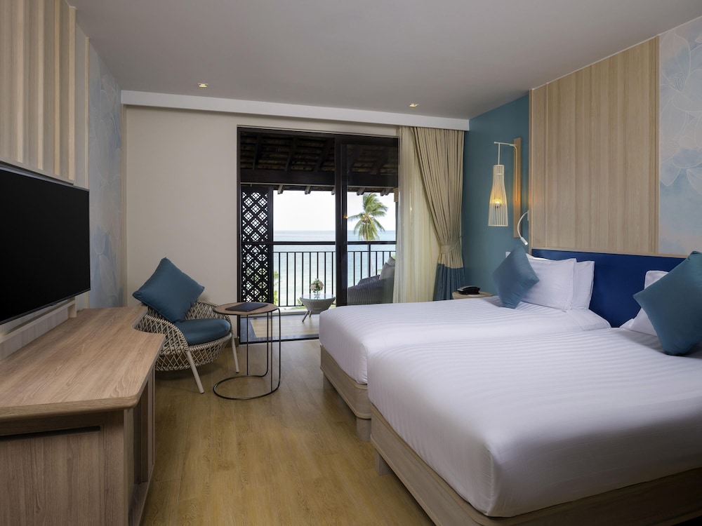 Habitación Deluxe con 2 Camas Individuales Vistas al Mar Ala Playa del hotel Mercure Samui Chaweng Tana