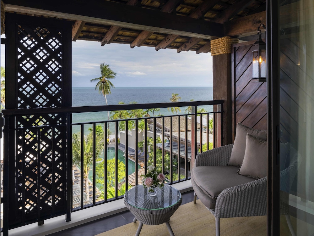 Habitación Deluxe con 2 Camas Individuales Vistas al Mar Ala Playa del hotel Mercure Samui Chaweng Tana. Foto 2
