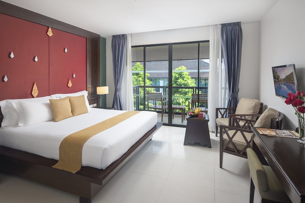Habitación Deluxe, 1 cama de matrimonio grande del hotel Centara Anda Dhevi Resort and Spa. Foto 1