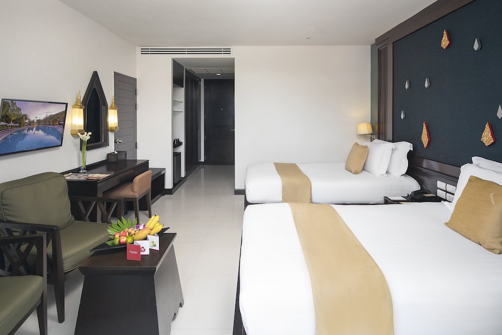 Habitación Deluxe con 2 camas individuales del hotel Centara Anda Dhevi Resort and Spa. Foto 1
