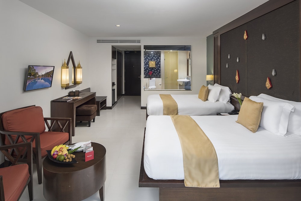Habitación Deluxe con 2 camas individuales del hotel Centara Anda Dhevi Resort and Spa. Foto 2