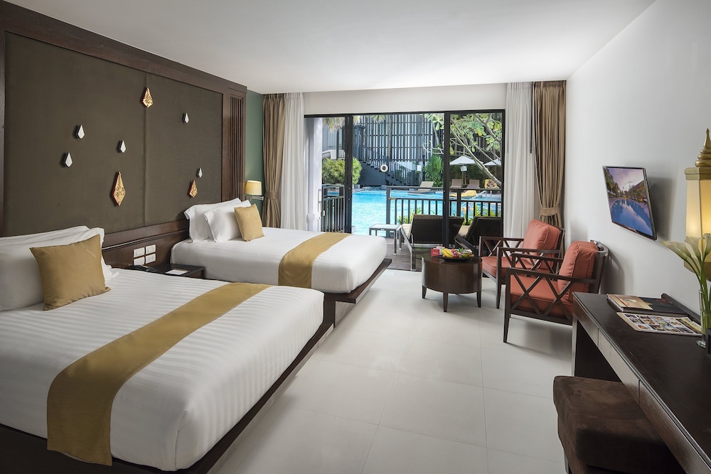 Habitación Deluxe, 2 camas dobles, acceso a la piscina del hotel Centara Anda Dhevi Resort and Spa. Foto 3