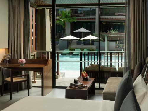Habitación Doble Deluxe con cama grande con acceso a la piscina del hotel Avista Hideaway Phuket Patong - Mgallery. Foto 2