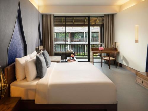 Habitación Deluxe con acceso a la piscina - 1 cama extragrande y sofá cama del hotel Avista Hideaway Phuket Patong - Mgallery. Foto 5