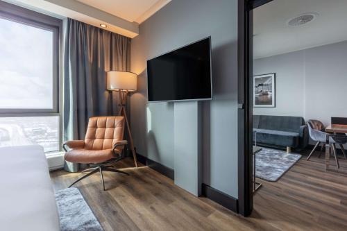 Suite Junior con vistas panorámicas a la ciudad del hotel Radisson Blu Scandinavia, Copenhagen. Foto 1