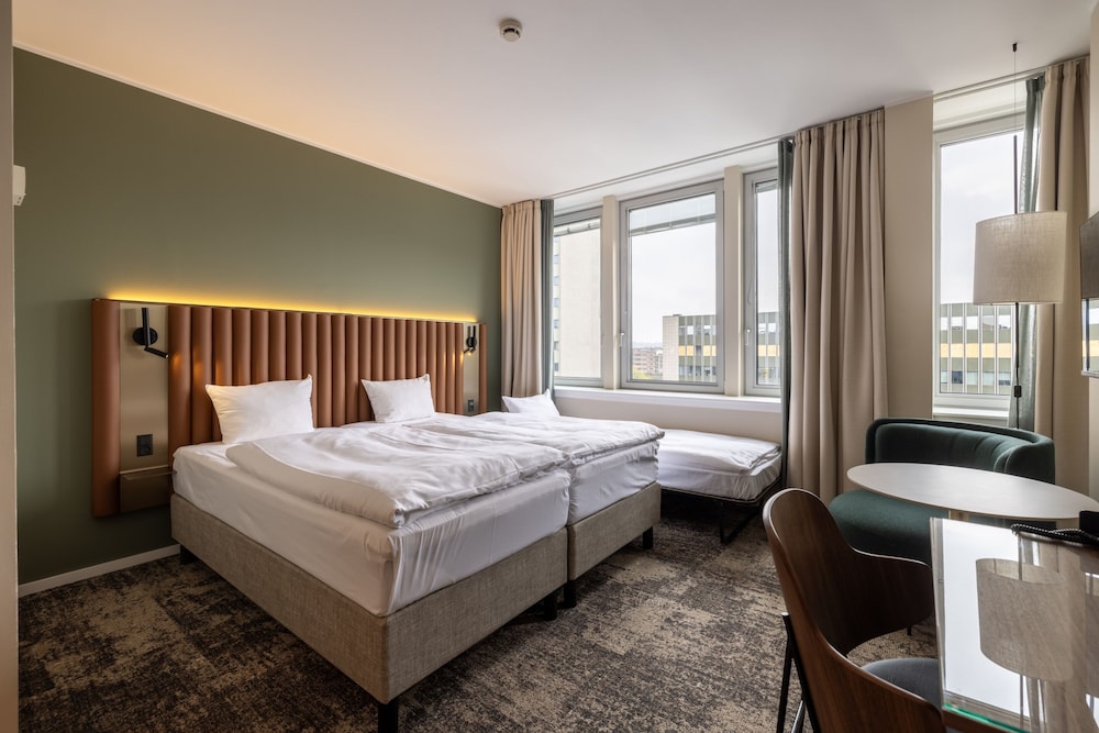 Habitación triple, varias camas del hotel Imperial