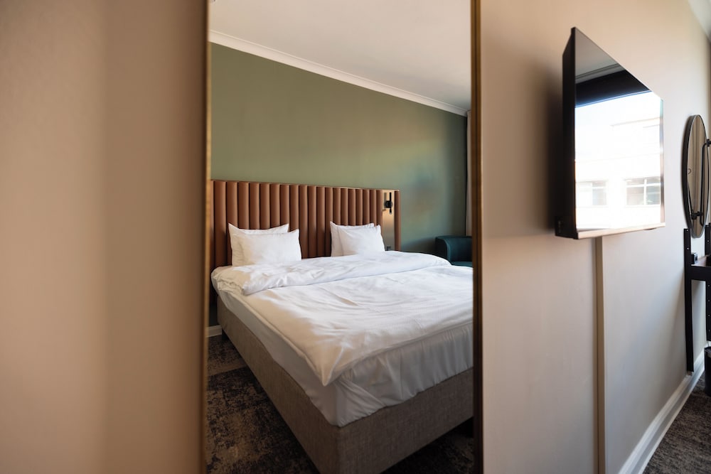Habitación triple, varias camas del hotel Imperial. Foto 1