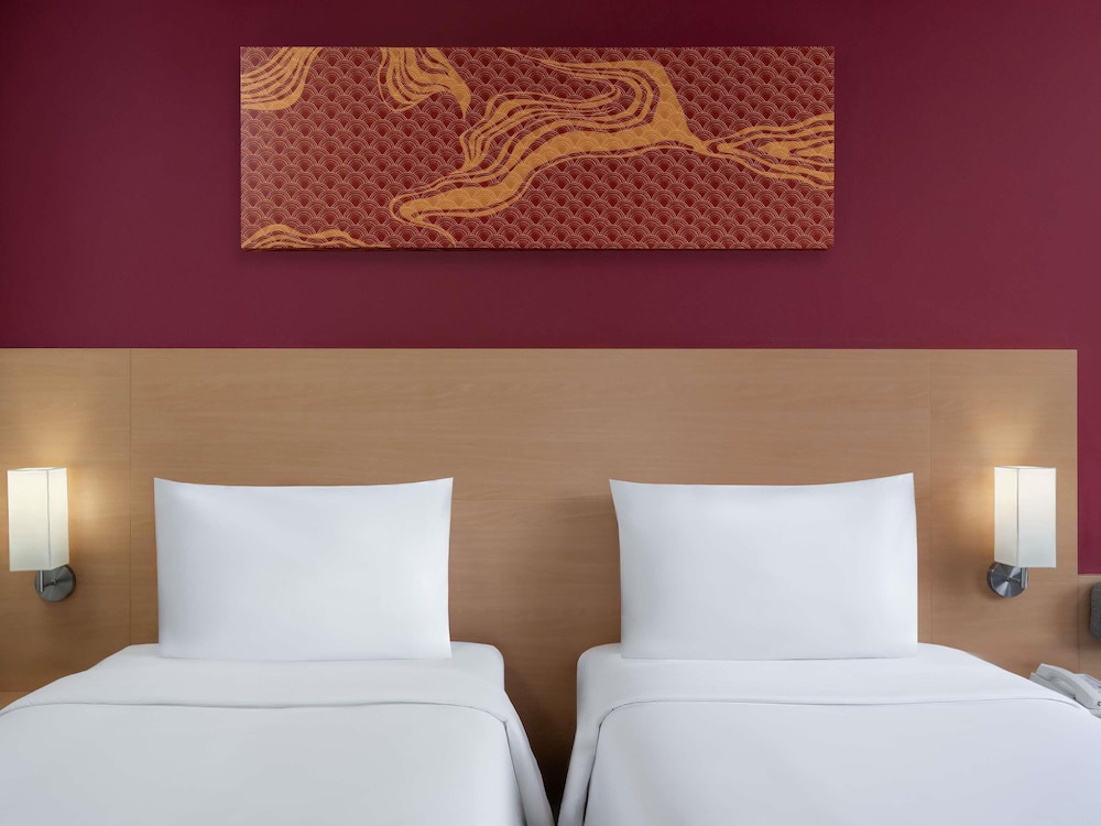 Estándar Dos Camas Individuales del hotel Ibis Bangkok Riverside. Foto 1