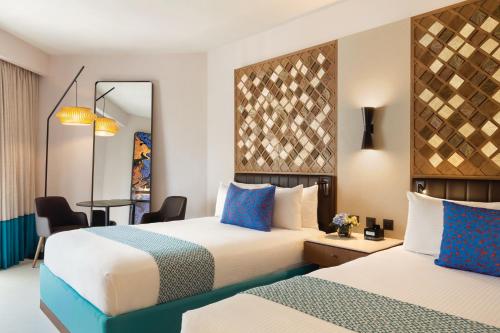 Habitación Premium con vistas al jardín - 2 camas grandes del hotel Secrets La Romana All-Inclusive Adult Only Resort & Spa. Foto 6