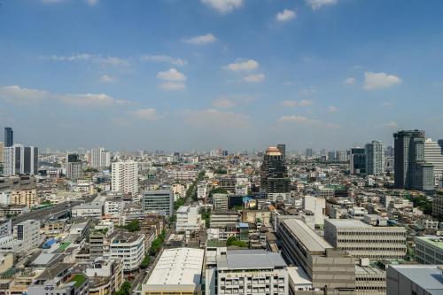 Habitación Doble Premium con vistas a la ciudad y acceso al salón - 2 camas del hotel Holiday Inn Bangkok Silom, An Ihg. Foto 2