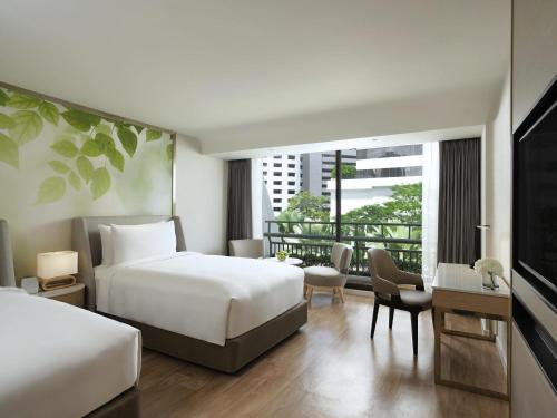 Habitación Doble Deluxe - 2 camas del hotel Mövenpick Bdms Wellness Resort Bangkok. Foto 2