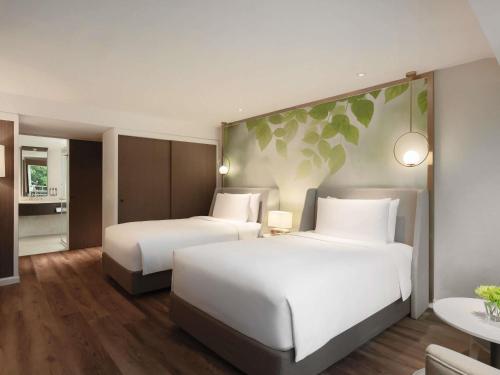 Habitación Doble Deluxe - 2 camas del hotel Mövenpick Bdms Wellness Resort Bangkok. Foto 4