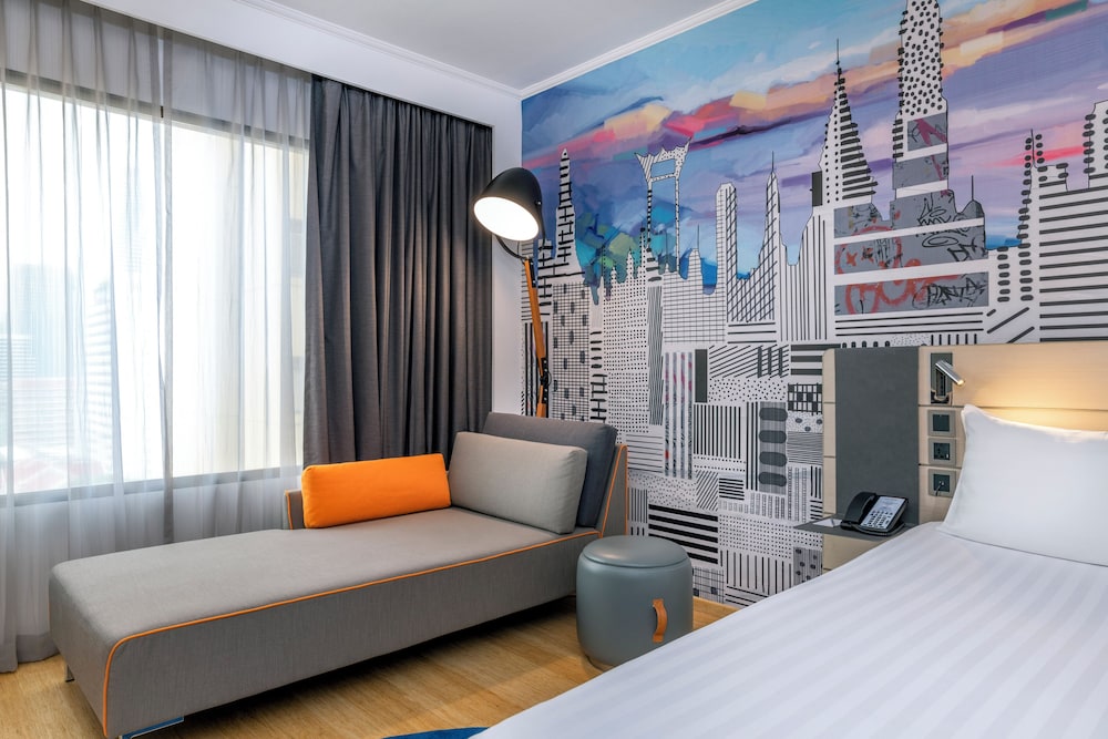 Habitación Deluxe 1 Cama Queen - size del hotel Novotel Bangkok On Siam Square. Foto 4