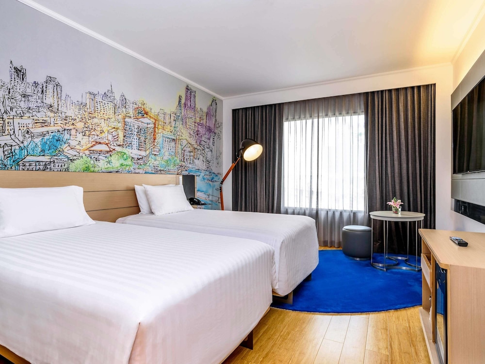 Habitación Deluxe 2 Camas Individuales del hotel Novotel Bangkok On Siam Square. Foto 1