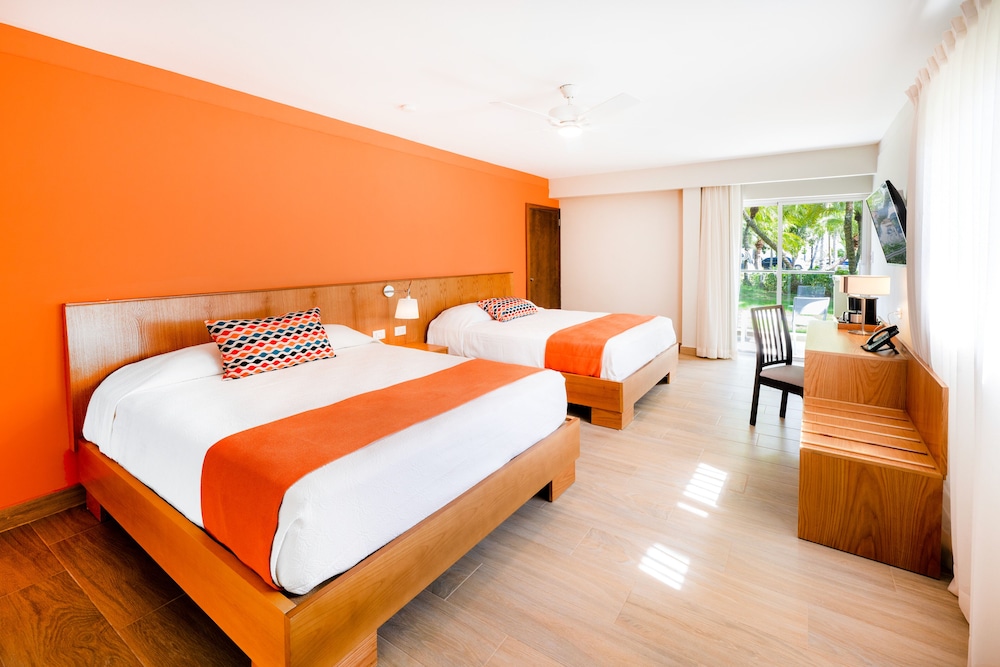 Habitación superior, 2 camas de matrimonio, balcón, vistas al jardín del hotel Coral Costa Caribe Beach Resort - All Inclusive
