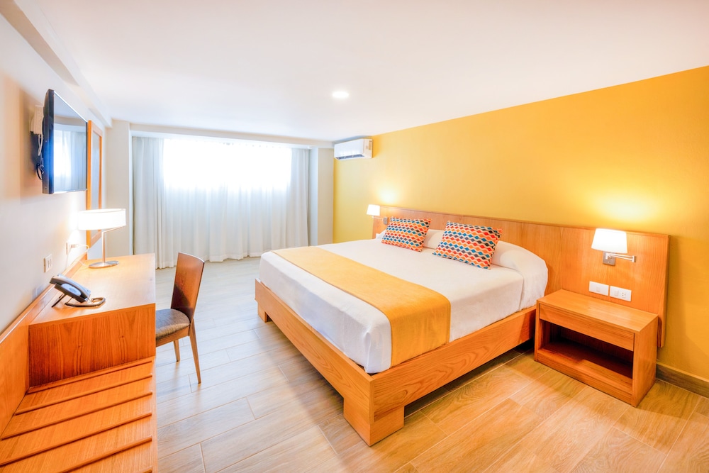Habitación estándar, 1 cama de matrimonio grande, vistas al jardín del hotel Coral Costa Caribe Beach Resort - All Inclusive