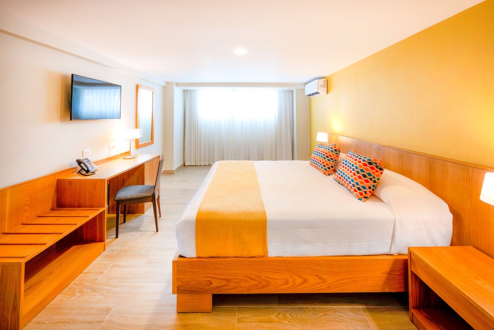 Habitación estándar, 1 cama de matrimonio grande, vistas al jardín del hotel Coral Costa Caribe Beach Resort - All Inclusive. Foto 2