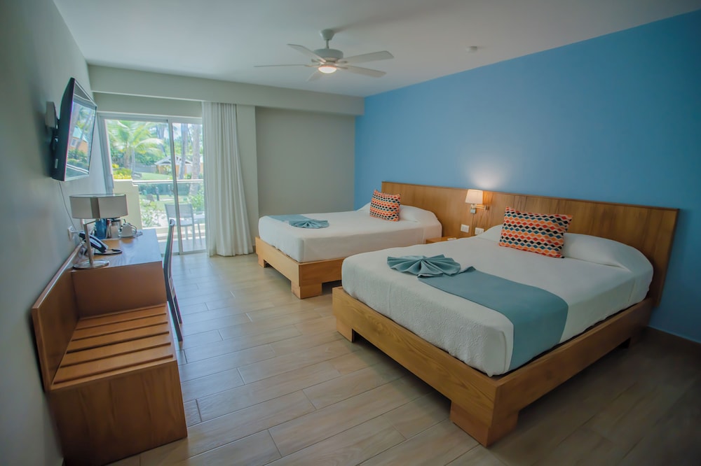 Habitación Deluxe, 2 camas de matrimonio, balcón, vistas al jardín del hotel Coral Costa Caribe Beach Resort - All Inclusive
