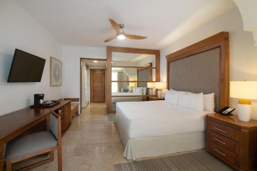 Suite Junior The Level con vistas al jardín del hotel Meliá Caribe Beach Resort. Foto 1