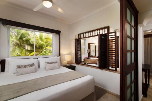 Suite The Level con vistas al jardín del hotel Meliá Caribe Beach Resort. Foto 6