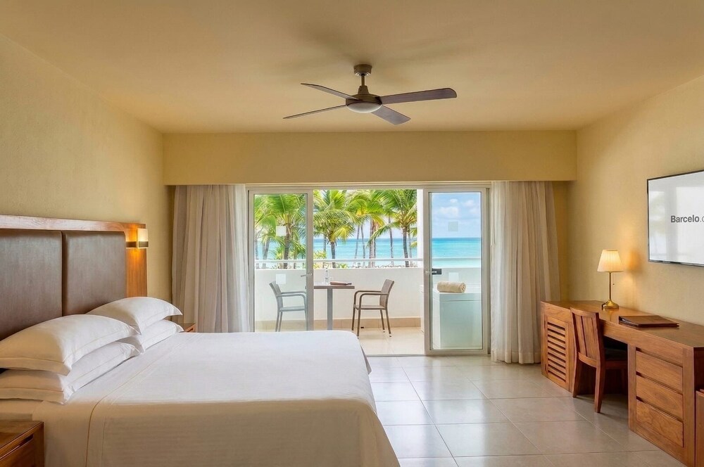 Junior suite 1 Cama king Royal Suite Estudio Vista Mar Frontal Normal del hotel Occidental Punta Cana - All Inclusive. Foto 1