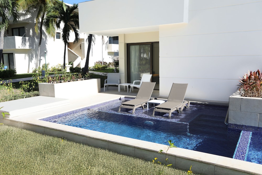 Privileged Deluxe Junior Suite Swim Up del hotel Catalonia Punta Cana - All Inclusive. Foto 4
