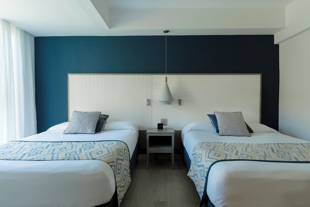 Privileged Family Deluxe Junior Suite del hotel Catalonia Punta Cana - All Inclusive. Foto 1