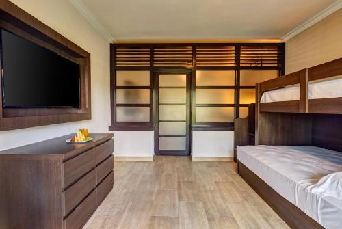 Habitación Familiar de lujo del hotel Royalton Splash Punta Cana, An Autograph Collection All-inclusive Resort and Casino. Foto 6