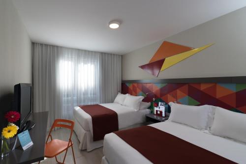 Habitación Executive Deluxe del hotel Novus Plaza Hodelpa. Foto 3