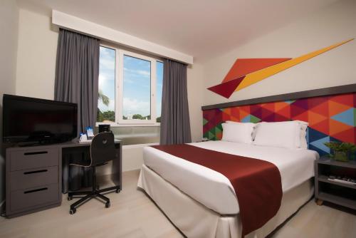 Habitación Deluxe del hotel Novus Plaza Hodelpa