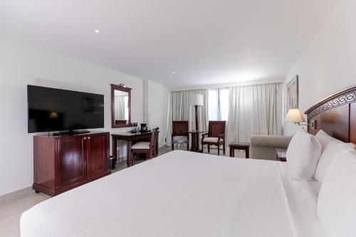 Executive del hotel Dominican Fiesta Hotel, Trademark By Wyndham. Foto 1
