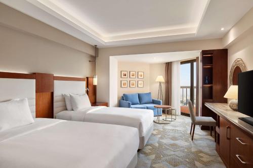 Habitación Doble Executive con vistas a la ciudad - 2 camas del hotel Ramses Hilton. Foto 10