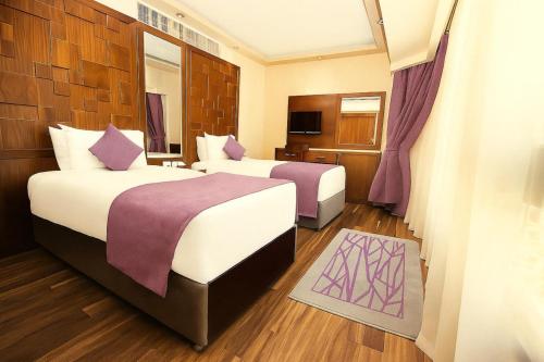 Habitación Doble Estándar - 2 camas del hotel Pyramisa Suites Cairo. Foto 1