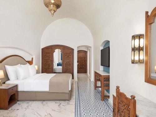 Comfort Queen Room - Ground Floor del hotel Movenpick Resort Sharm El Sheik Naama Bay. Foto 2