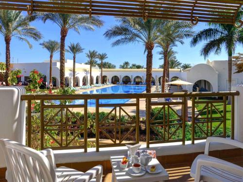 Habitación Estándar con 2 camas individuales, lado piscina (Ala Palm) del hotel Novotel Sharm El-sheikh. Foto 4