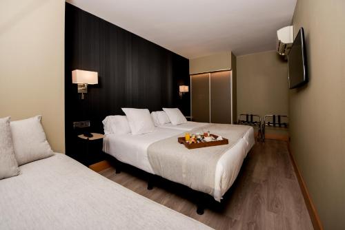 Habitación Triple del hotel Plaza. Foto 2