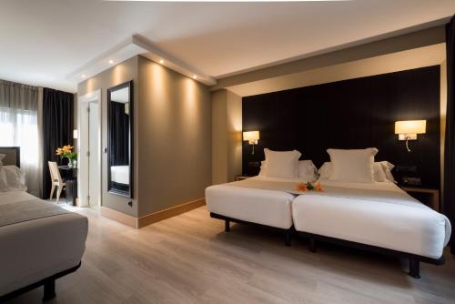 Habitación Familiar del hotel Plaza. Foto 8