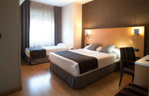 Habitación Triple del hotel Universal