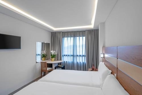 2 camas individuales del hotel Faranda Los Tilos