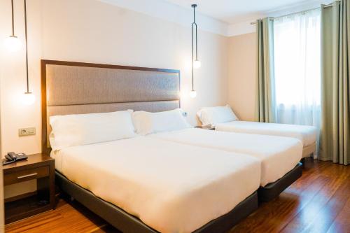 Habitación Triple del hotel Compostela