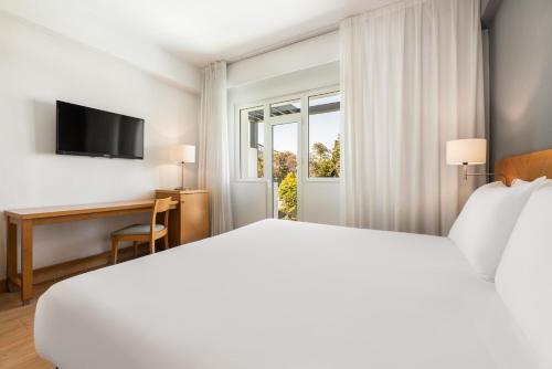 Habitación Doble Deluxe con balcón - 1 o 2 camas del hotel Exe Peregrino