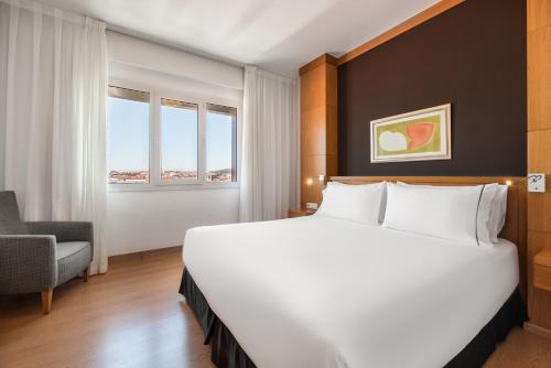 Habitación Familiar del hotel Exe Peregrino. Foto 1