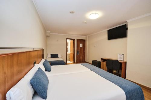 Habitación Doble Económica del hotel Ciudad de Compostela. Foto 1